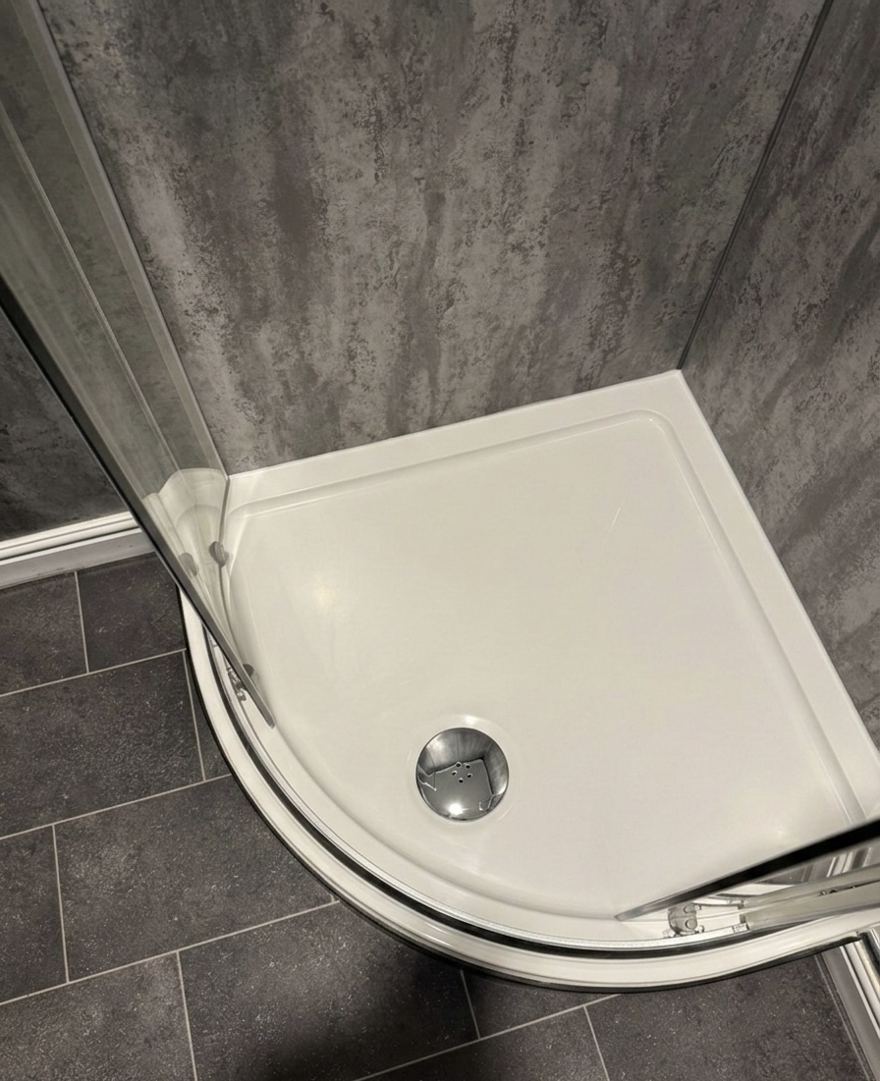 The same shower tray after professional cleaning by Cadence Clean