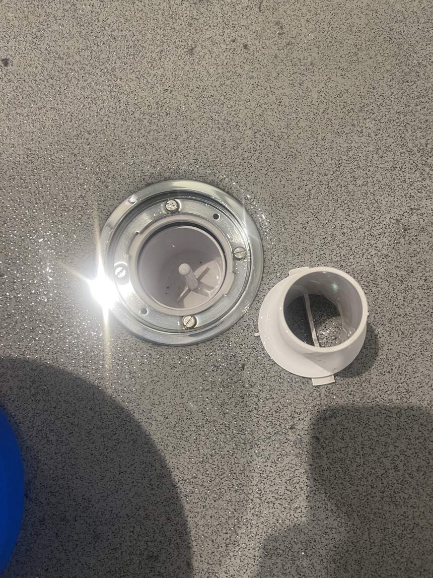 The same shower drain after professional cleaning by Cadence Clean
